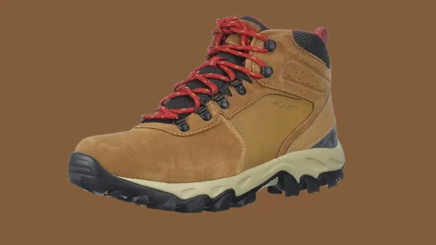 Men's hiking boots on a rocky trail, showcasing durability and support for outdoor adventures.