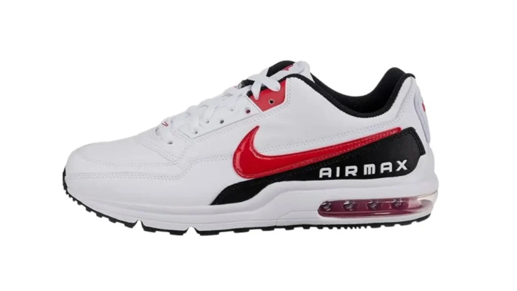 Top view of white Nike sneaker with red and black accents.